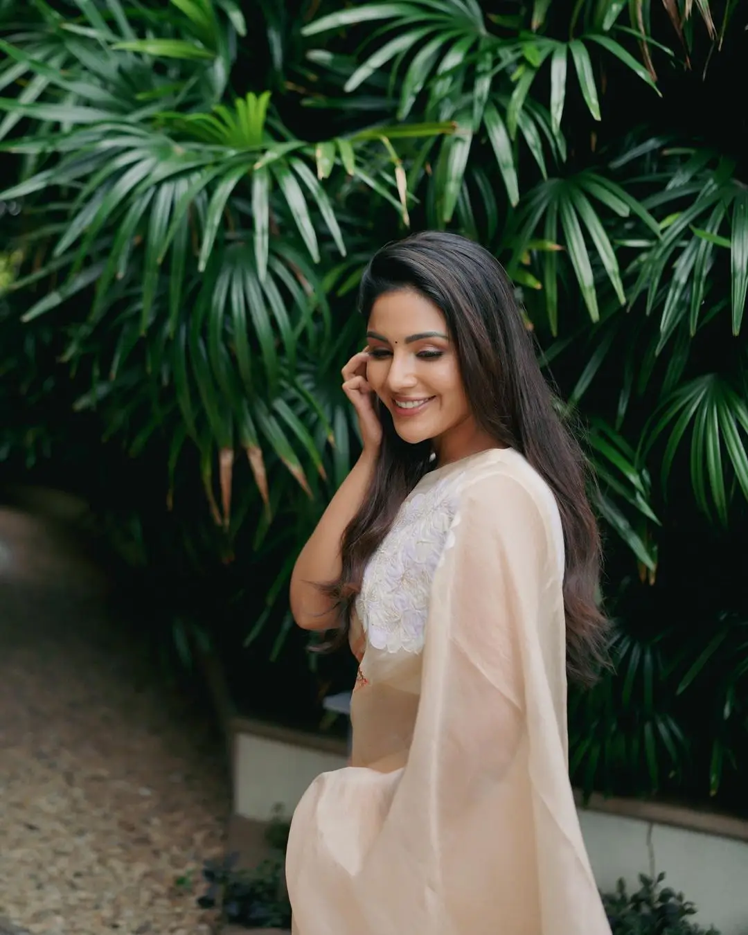 Samyuktha Menon Wearing Beautiful Earring Sleeveless White Saree